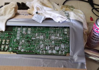 Circuit board masked off for sealing with lacquer